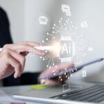 person using laptop with AI interface