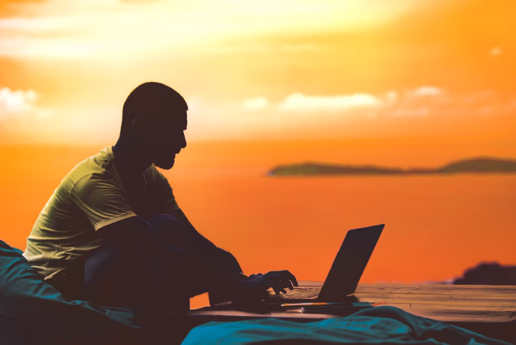 sunset with laptop silhouette