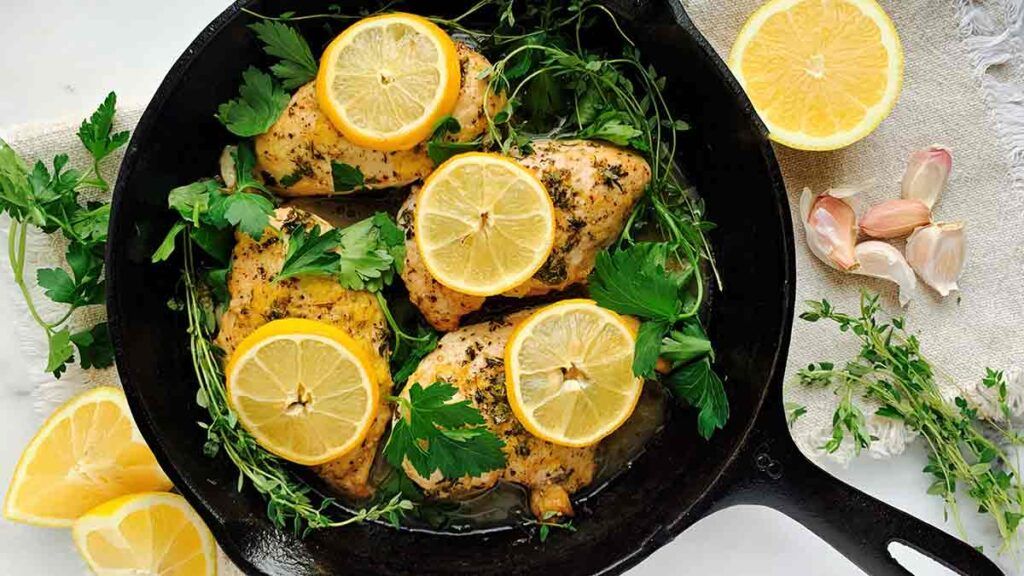 skillet with chicken and lemon