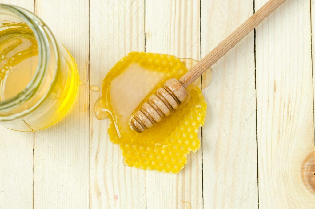 best foods to immune system -honey jar with spoon
