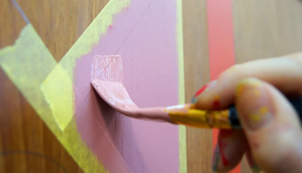 hands painting furniture