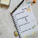 meal planning notebook on kitchen table