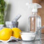 spray bottles with lemons and baking soda