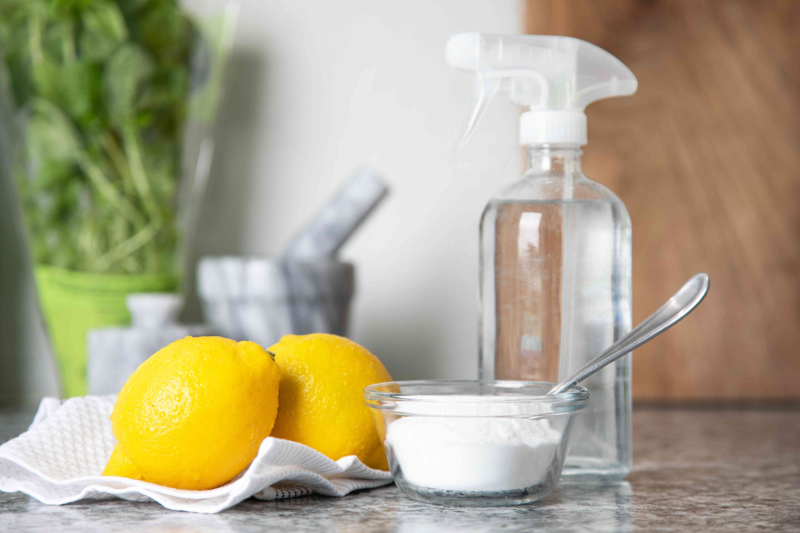 spray bottles with lemons and baking soda