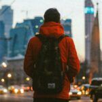 backpacker overlooking city