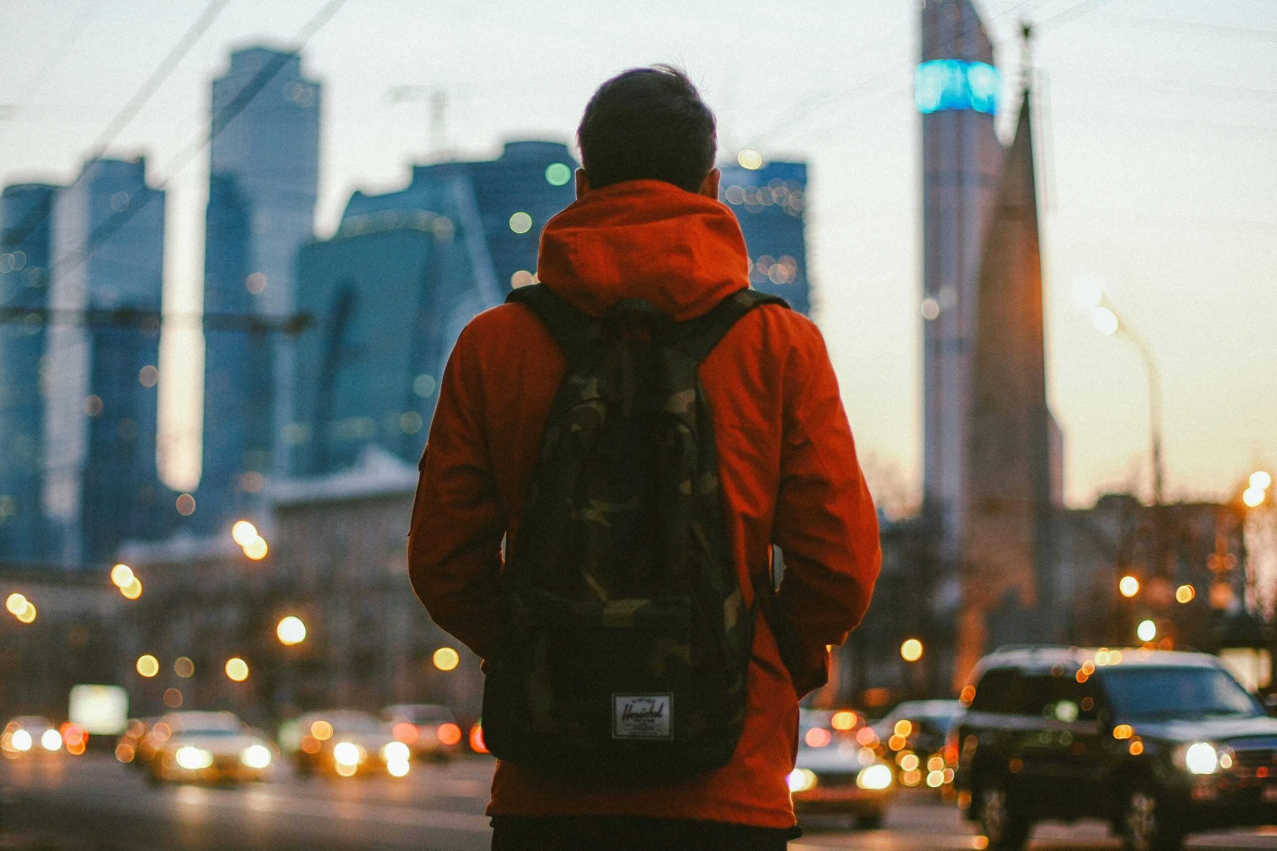 backpacker overlooking city