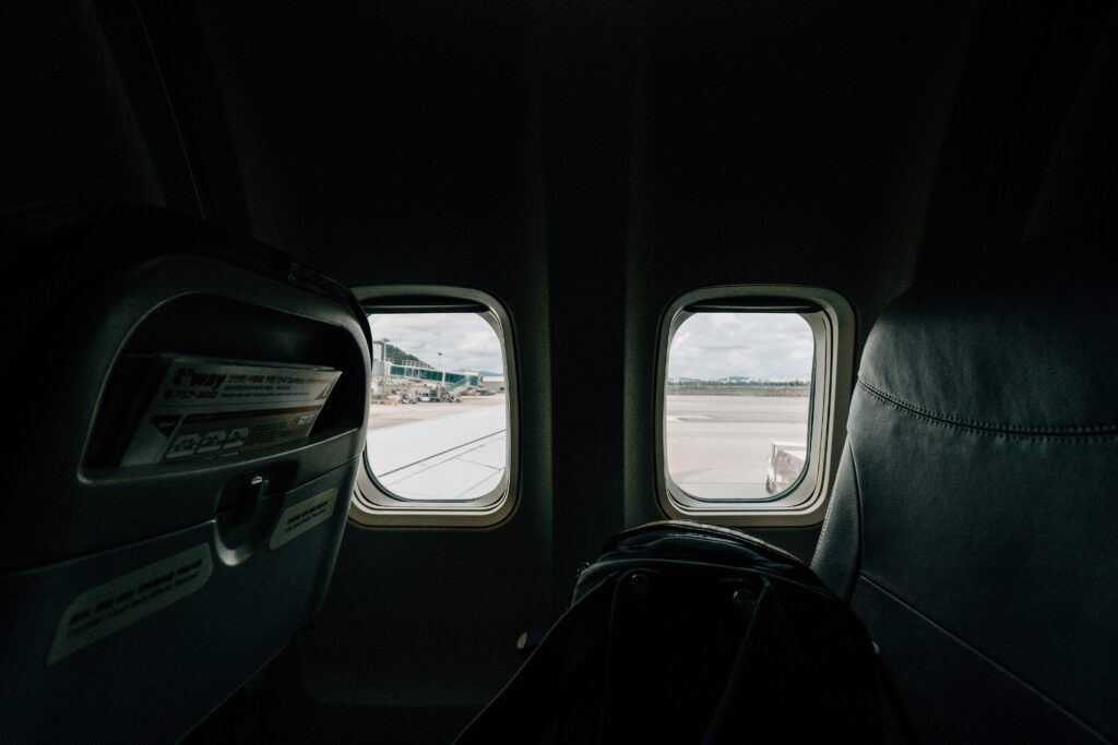 suitcase and plane window