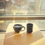 sunlight through window with coffee cup