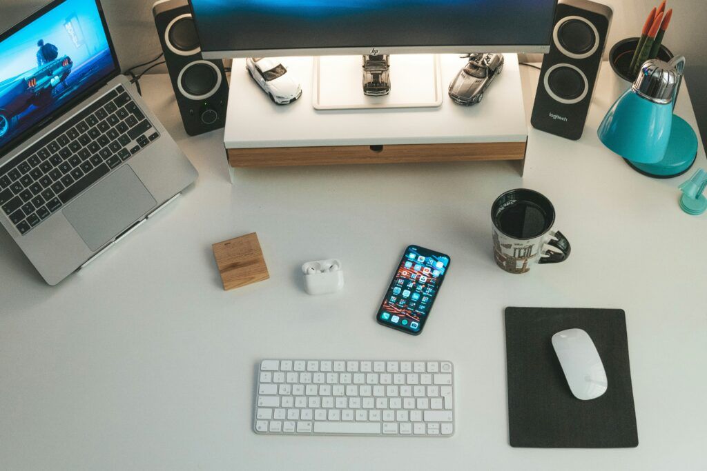 minimal workspace with phone and notebook