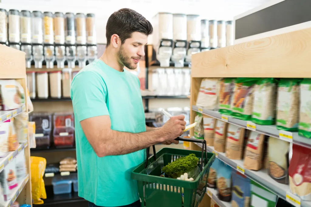 person checking shopping list