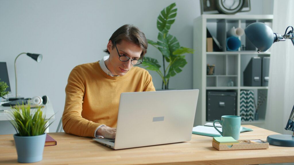 person using laptop with AI interface