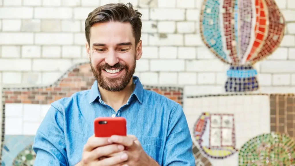 happy person using finance app
