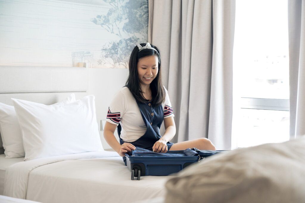 cozy hotel unpacking scene